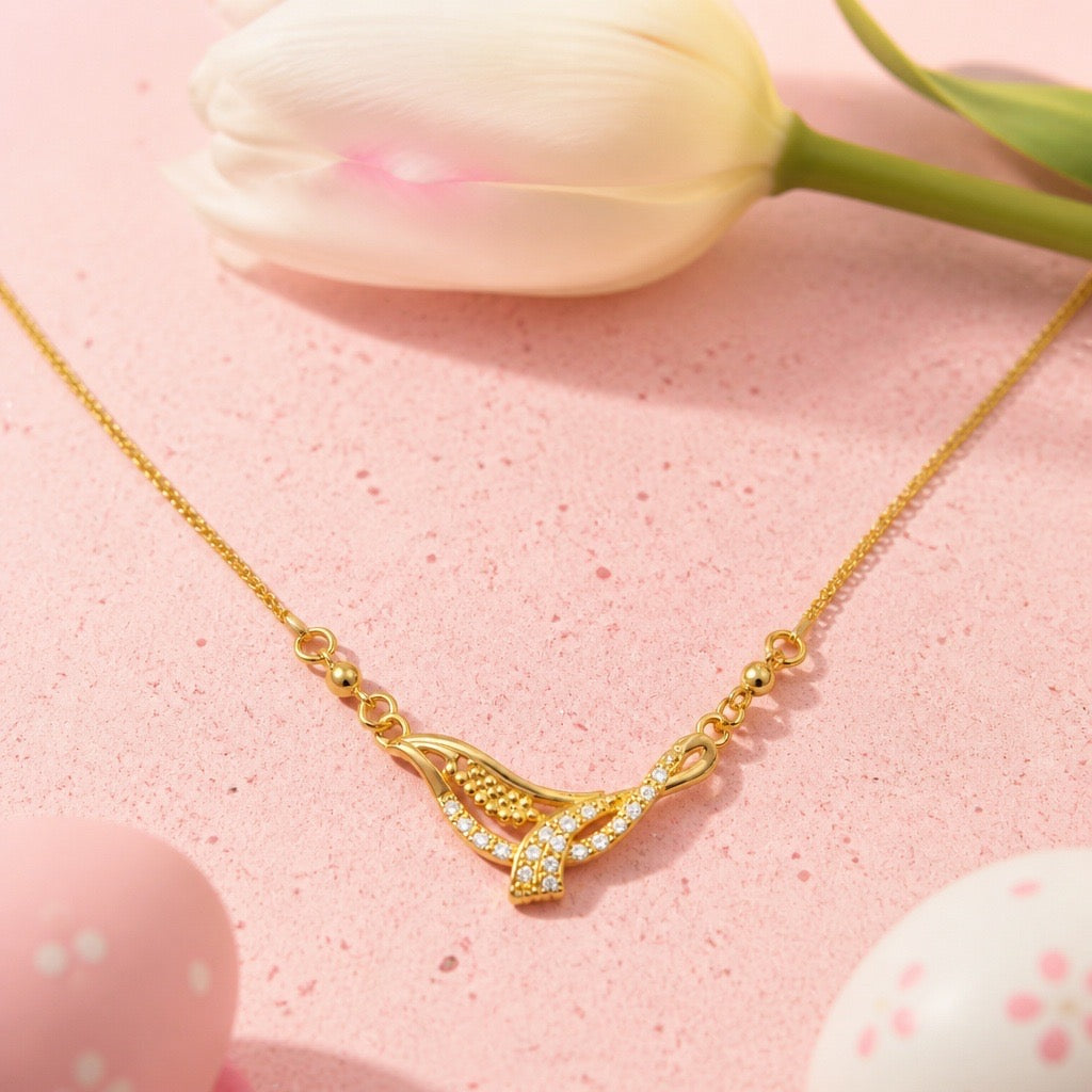 CRYSTAL INFINITY KNOT PENDANT NECKLACE