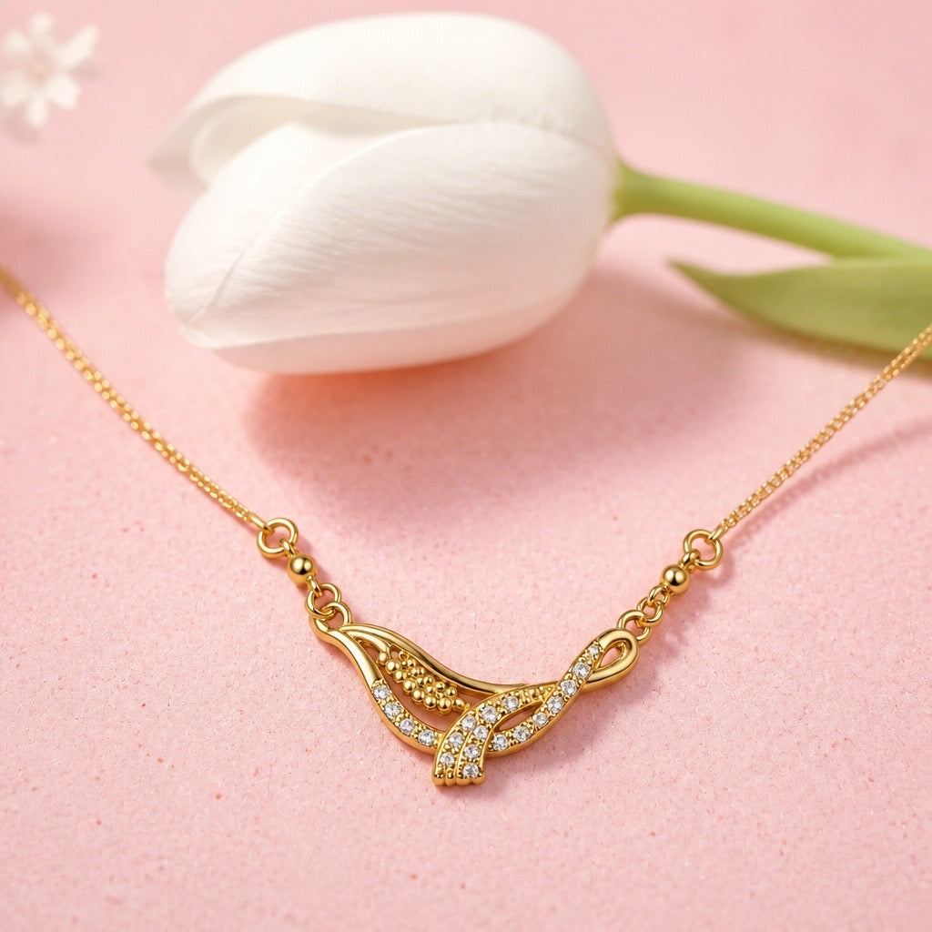 CRYSTAL INFINITY KNOT PENDANT NECKLACE